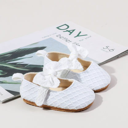 Children's shoe with bow