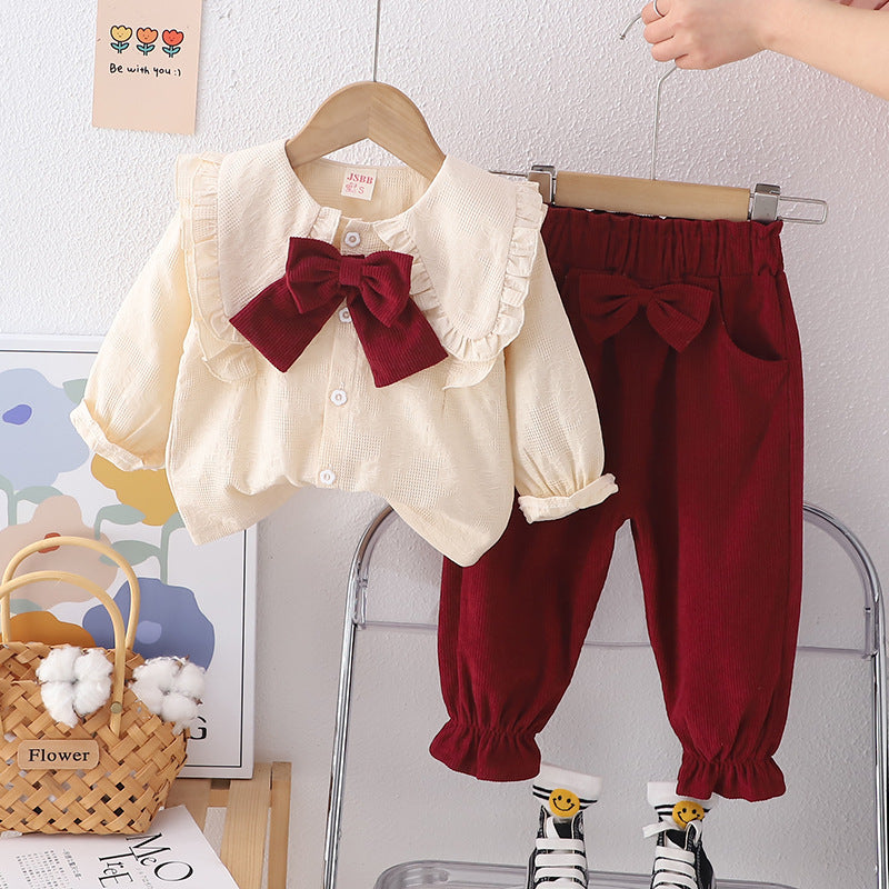 Conjunto infantil de mujer con botones de lazo 