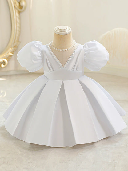 Vestido de fiesta abullonado con perlas 