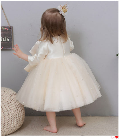 Vestido de fiesta infantil con perlas y lazo
