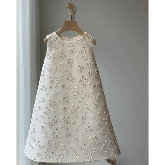 Vestido infantil con flores y lazo 