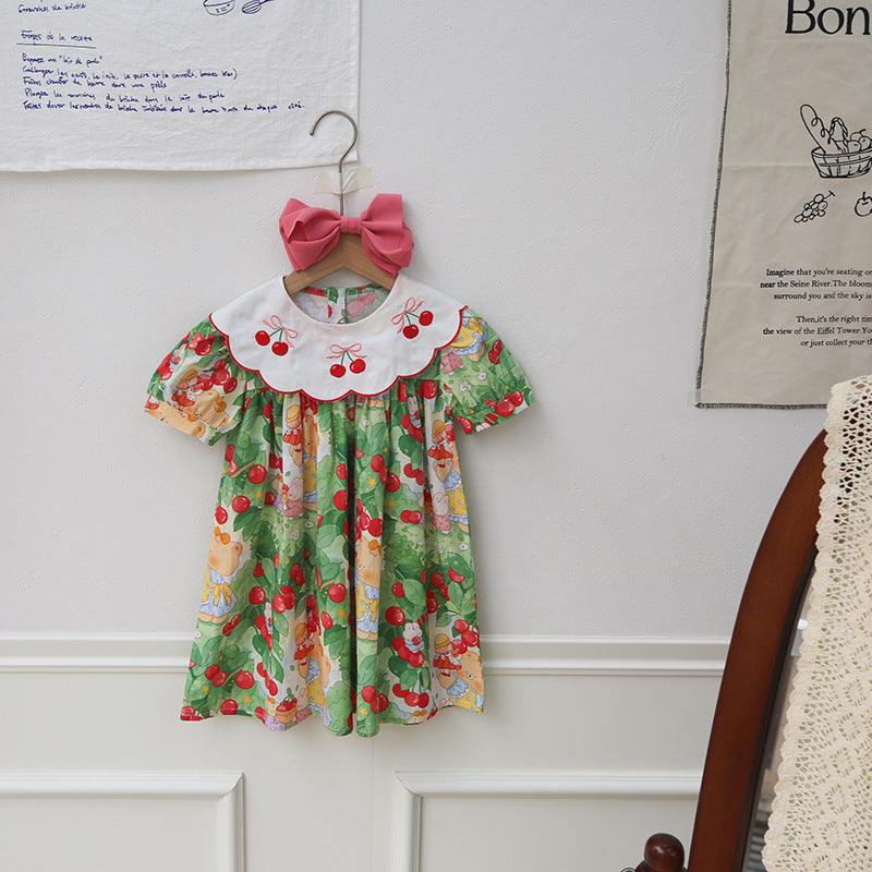 Vestido infantil con cuello de cereza