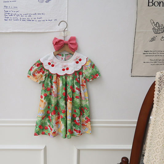 Vestido infantil con cuello de cereza