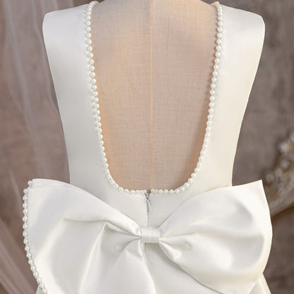 Vestido infantil de perla blanca 