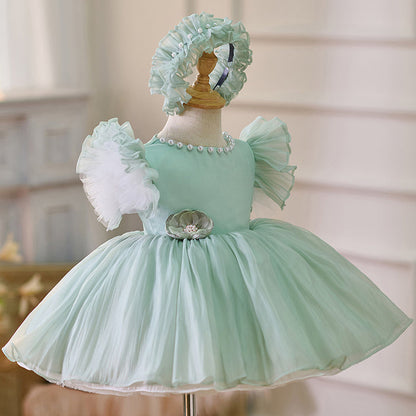 Vestido de fiesta verde con perlas y flores 