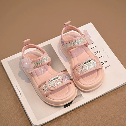 Sandalias infantiles con flores brillantes 