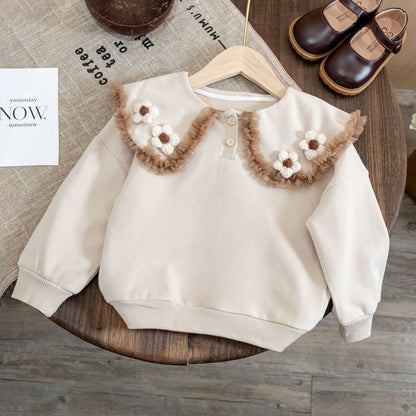 Blusa infantil con cuello floral 