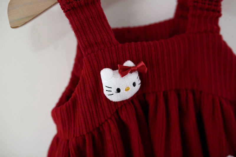 Children's blouse and dress with kitten print.
