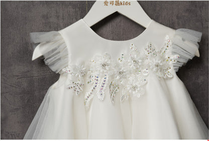 Vestido infantil blanco con flores y lazo 