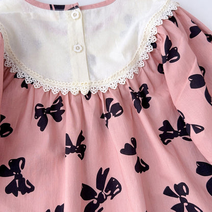 Vestido infantil con lazos 