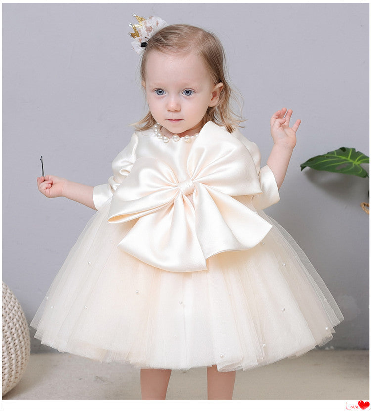 Vestido de fiesta infantil con perlas y lazo