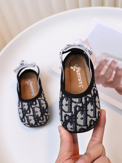 Zapatos de niña con lazo 