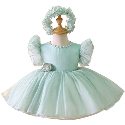 Vestido de fiesta verde con perlas y flores 