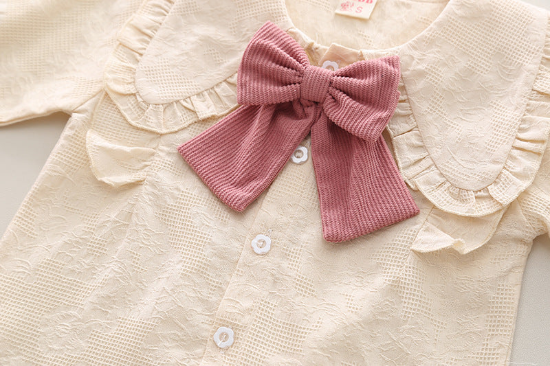 Conjunto infantil de mujer con botones de lazo 