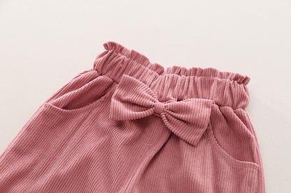 Conjunto infantil de mujer con botones de lazo 