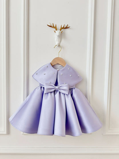 Vestido infantil con lazo y perlas 