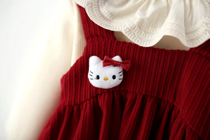 Children's blouse and dress with kitten print.