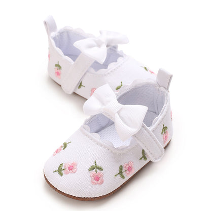 Children's Shoes with Little Flowers and a Small Bow