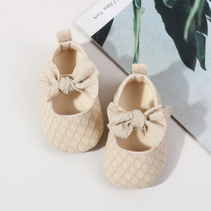 Children's shoe with bow