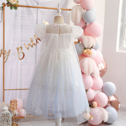 White children's dress with glitter.