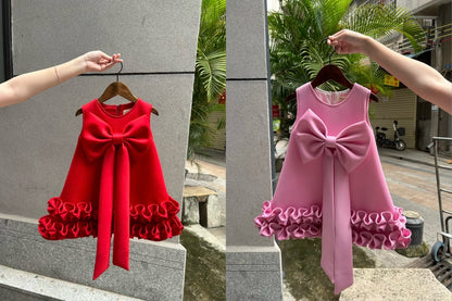 Children's Dress with Ruffles and Bow Hem
