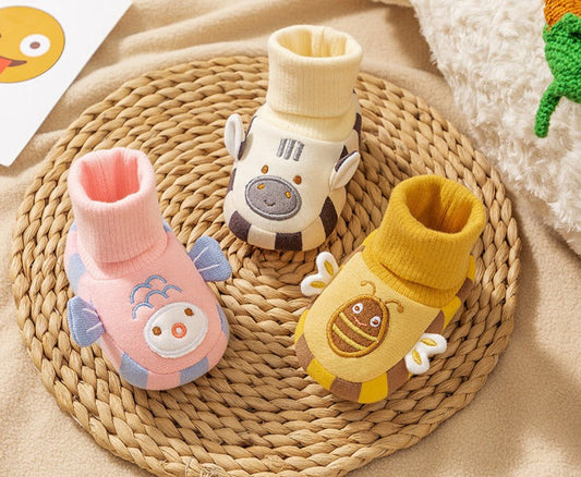 Zapatos infantiles de animales de invierno