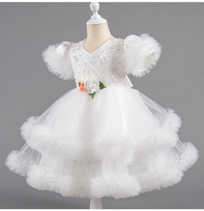 Vestido infantil de tul abullonado con flores 