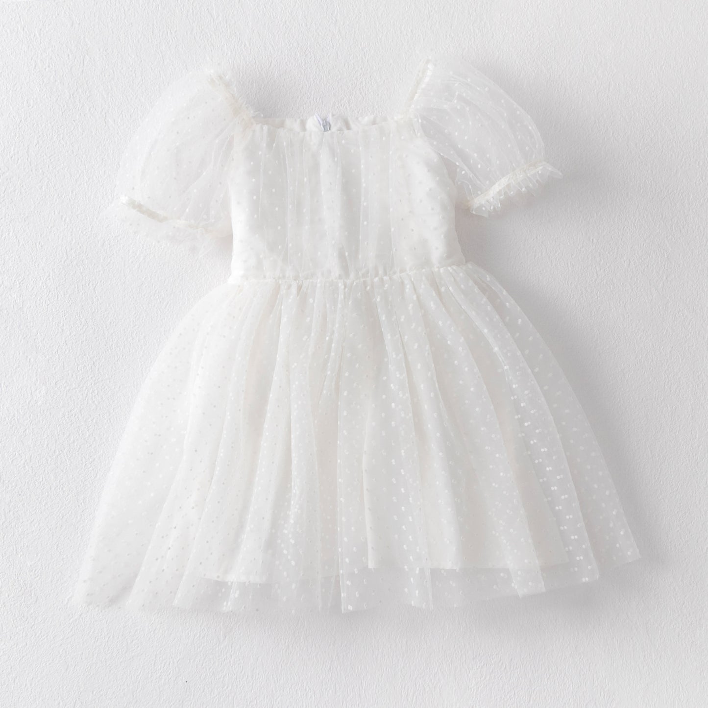 Vestido infantil con lazo de tul y lunares 