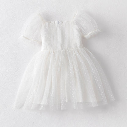 Vestido infantil con lazo de tul y lunares 