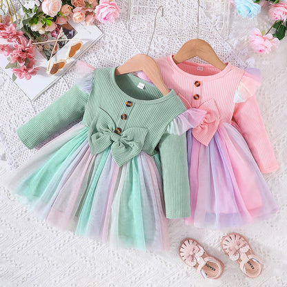 Vestido infantil con lazo y falda colorida