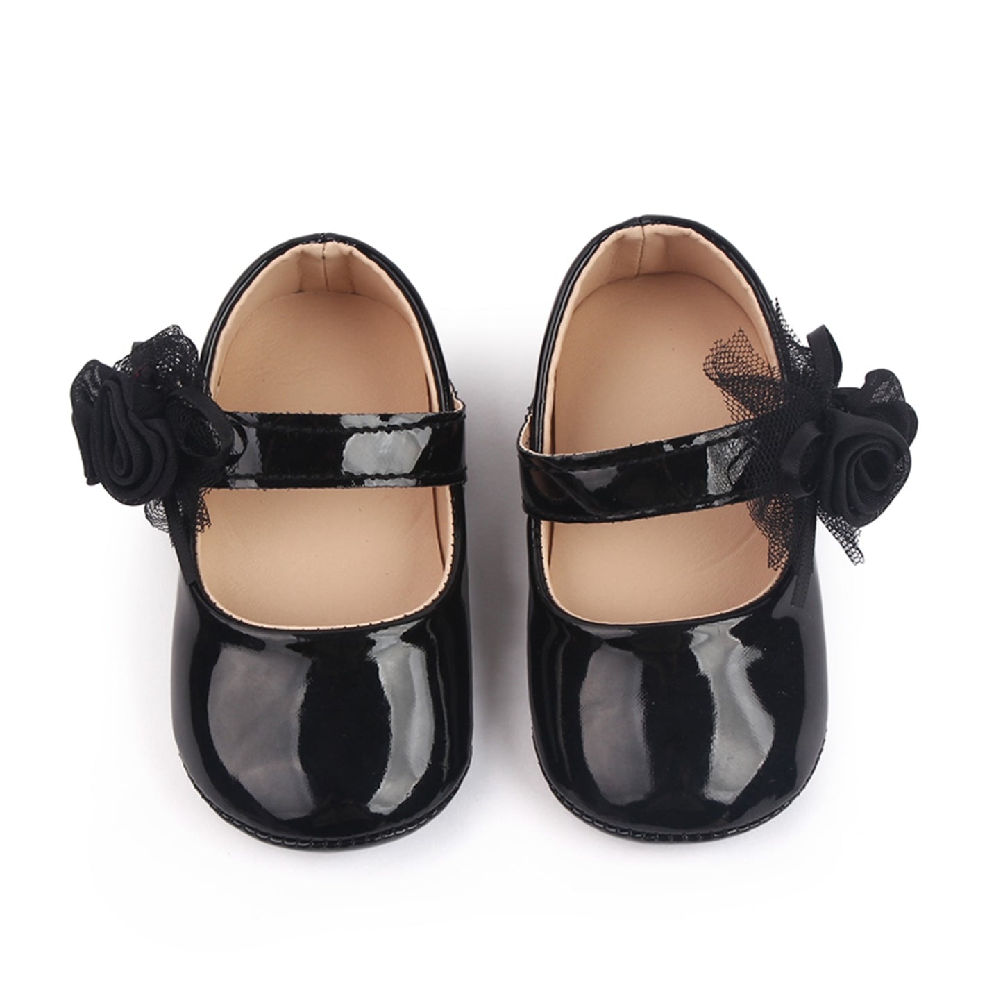 Zapatos de bebé con flor
