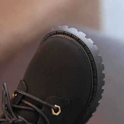 Bota de moda para niños