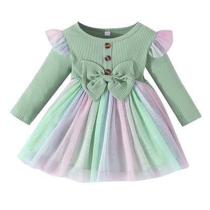Vestido infantil con lazo y falda colorida