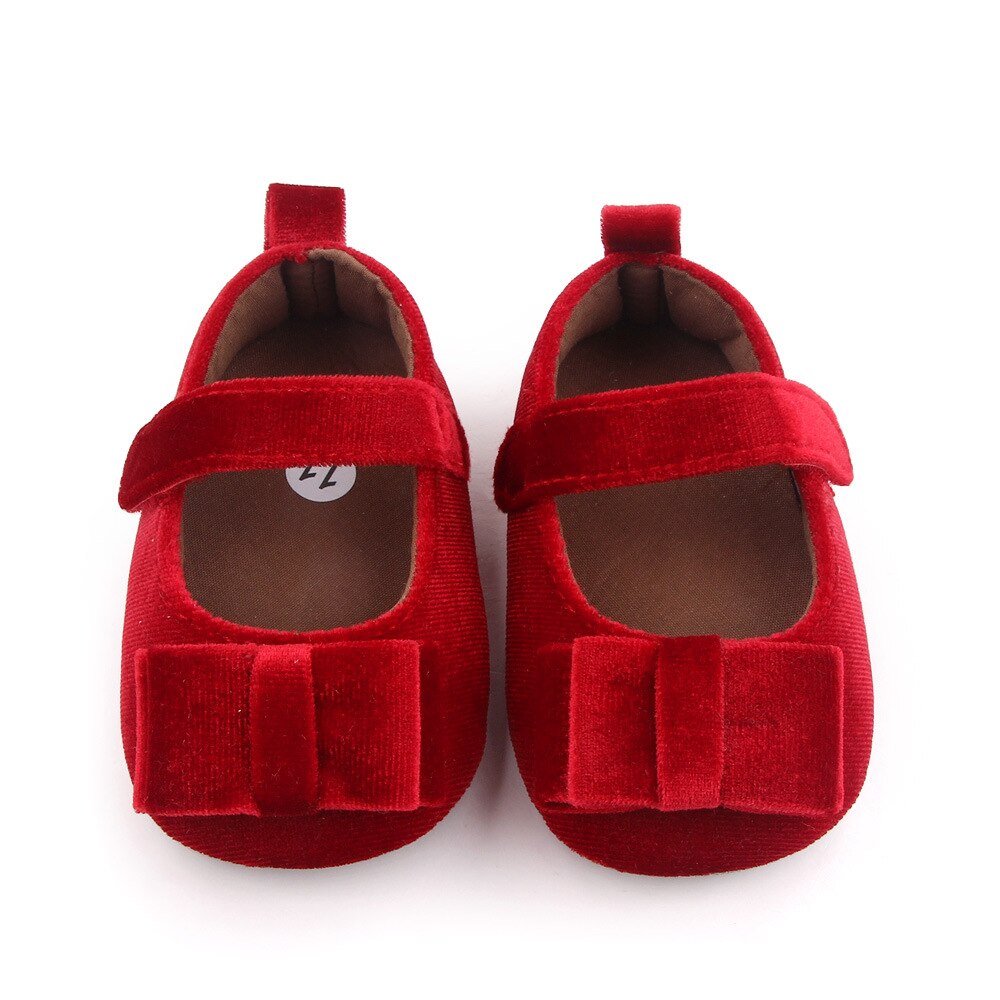 Zapato de bebé con lazo