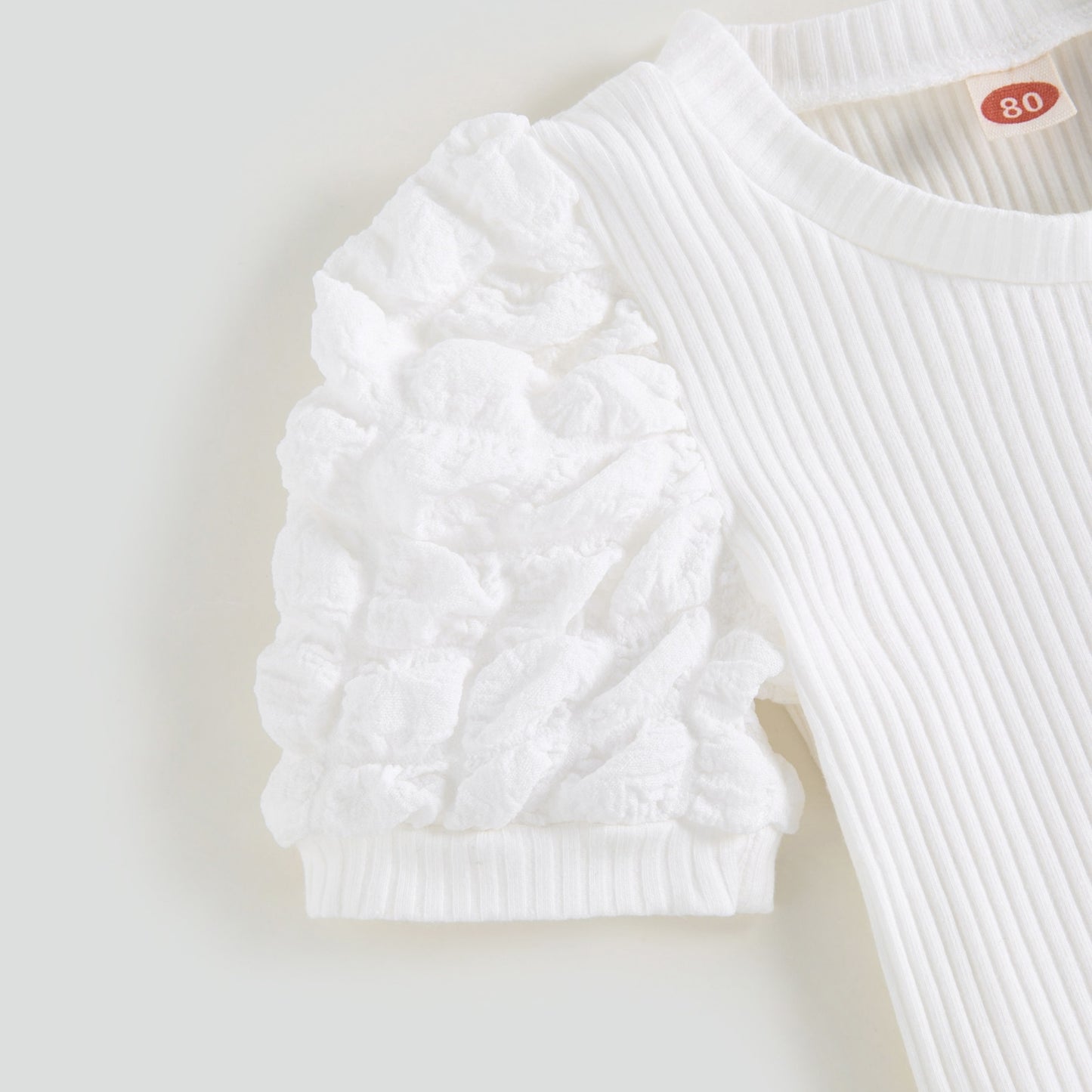 Conjunto infantil con falda marrón a cuadros 