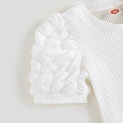 Conjunto infantil con falda marrón a cuadros 