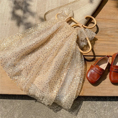 Vestido infantil con lazo y lentejuelas 