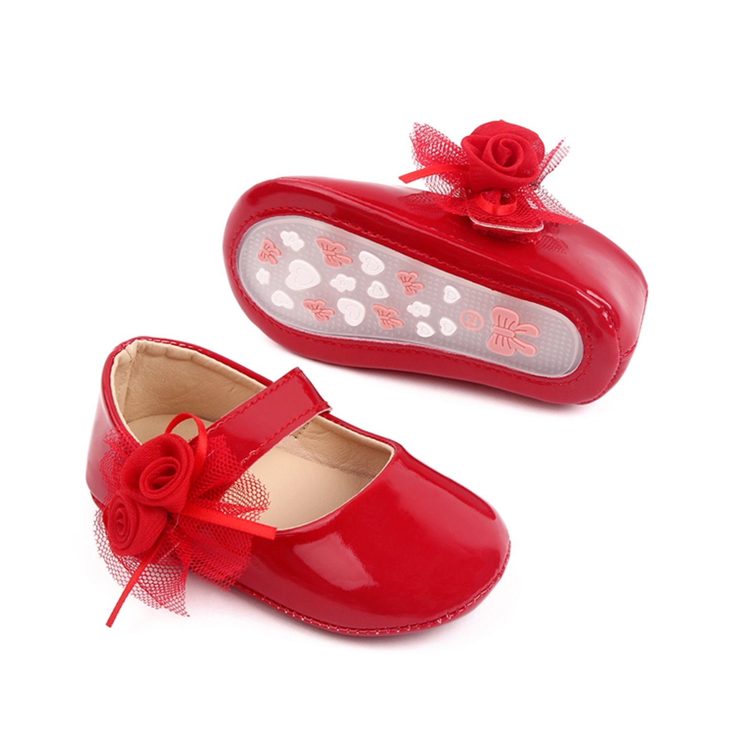 Zapatos de bebé con flor