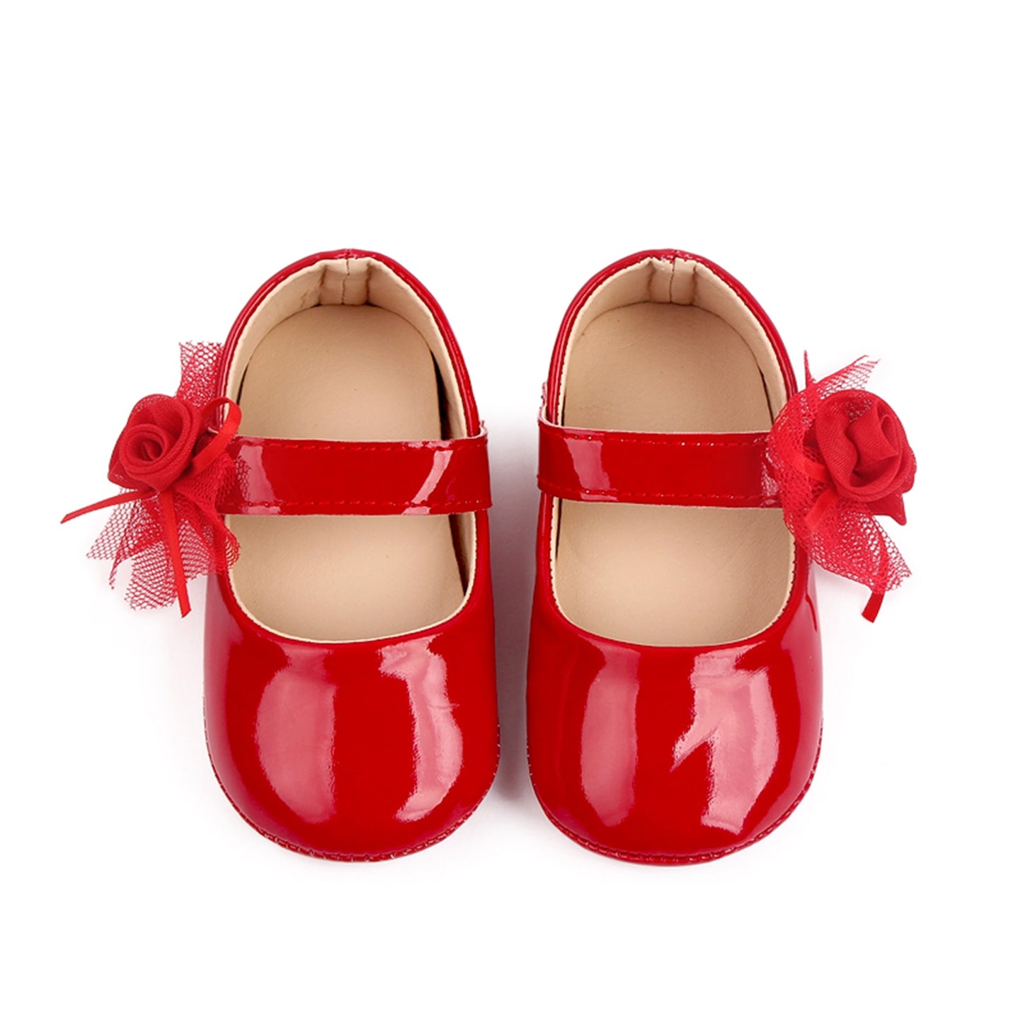 Zapatos de bebé con flor