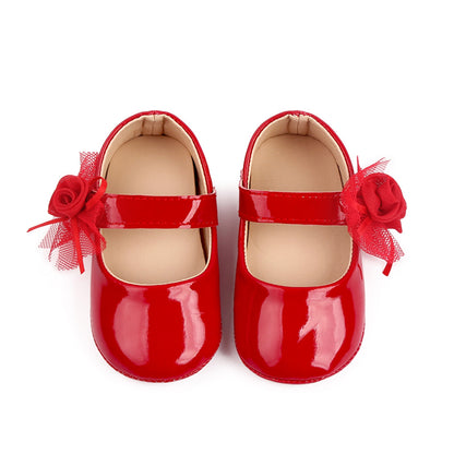 Zapatos de bebé con flor