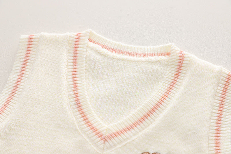 Vestido infantil con chaleco y bolso de osito
