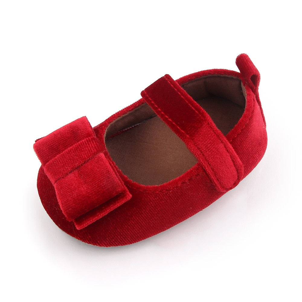 Zapato de bebé con lazo