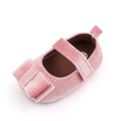 Zapato de bebé con lazo