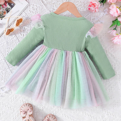 Vestido infantil con lazo y falda colorida
