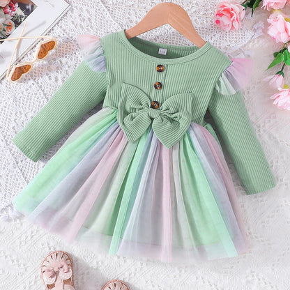 Vestido infantil con lazo y falda colorida