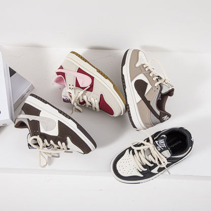 Elegantes zapatillas NK para niños con cordones 