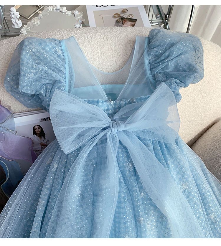 Vestido infantil con lazo y purpurina azul 