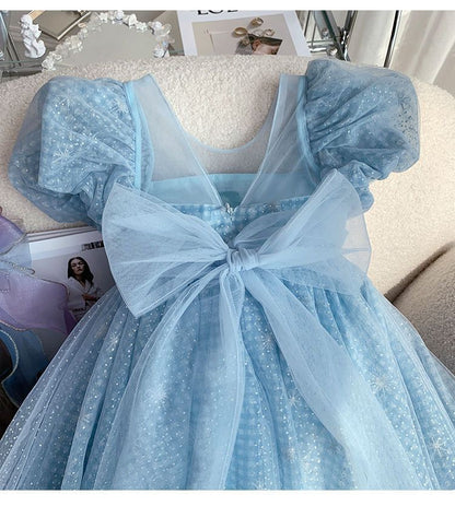 Vestido infantil con lazo y purpurina azul 