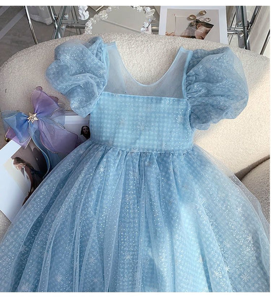Vestido infantil con lazo y purpurina azul 
