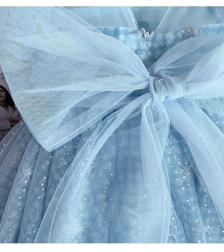 Vestido infantil con lazo y purpurina azul 